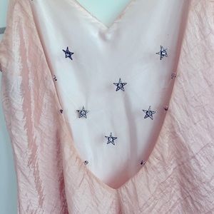 Light pink full length dress with floating rhinestone star back